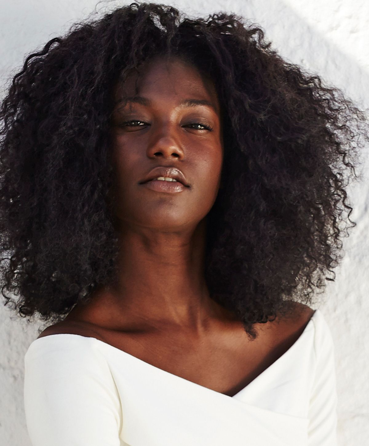 Close-up of a woman with flowing hair.